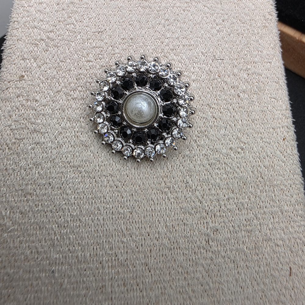 Elegant Silver and Black Pearl Button (1927)